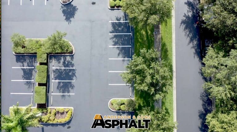 Asphalt over concrete parking lot