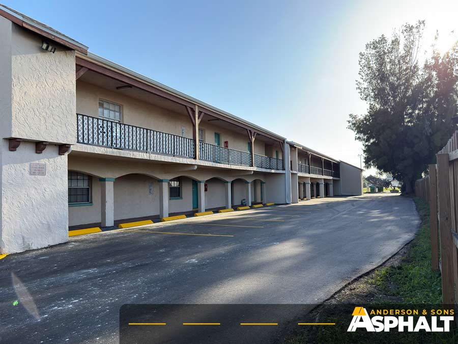 Freshly paved asphalt along commercial property after resurfacing in Clearwater
