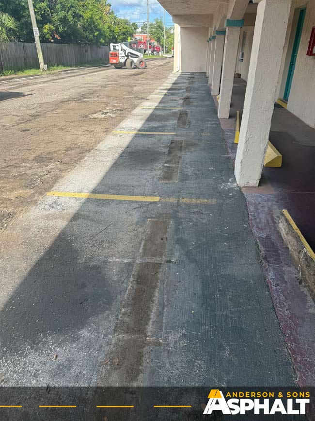 Milled parking lot before new asphalt paving at Clearwater commercial property