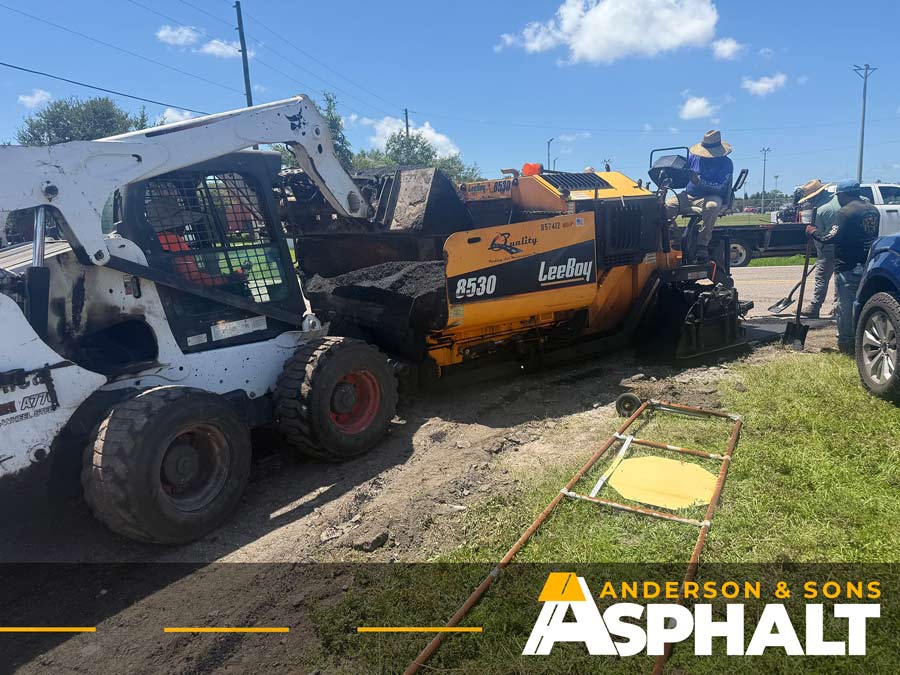 Asphalt paving machine installing new pavement during Clearwater resurfacing project