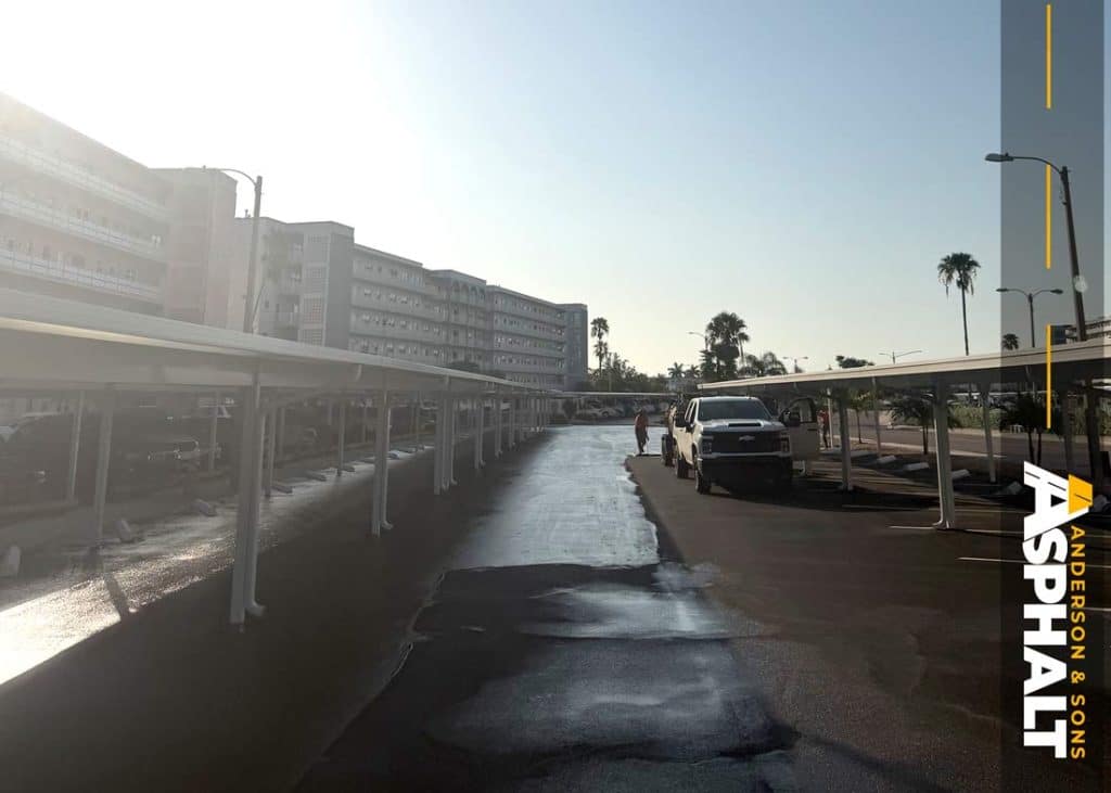 Parking lot sealcoating in progress at 6025 Shore Blvd in Gulfport, FL