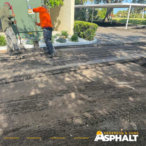 Complete asphalt parking lot resurfacing.  All old asphalt pavement totally removed