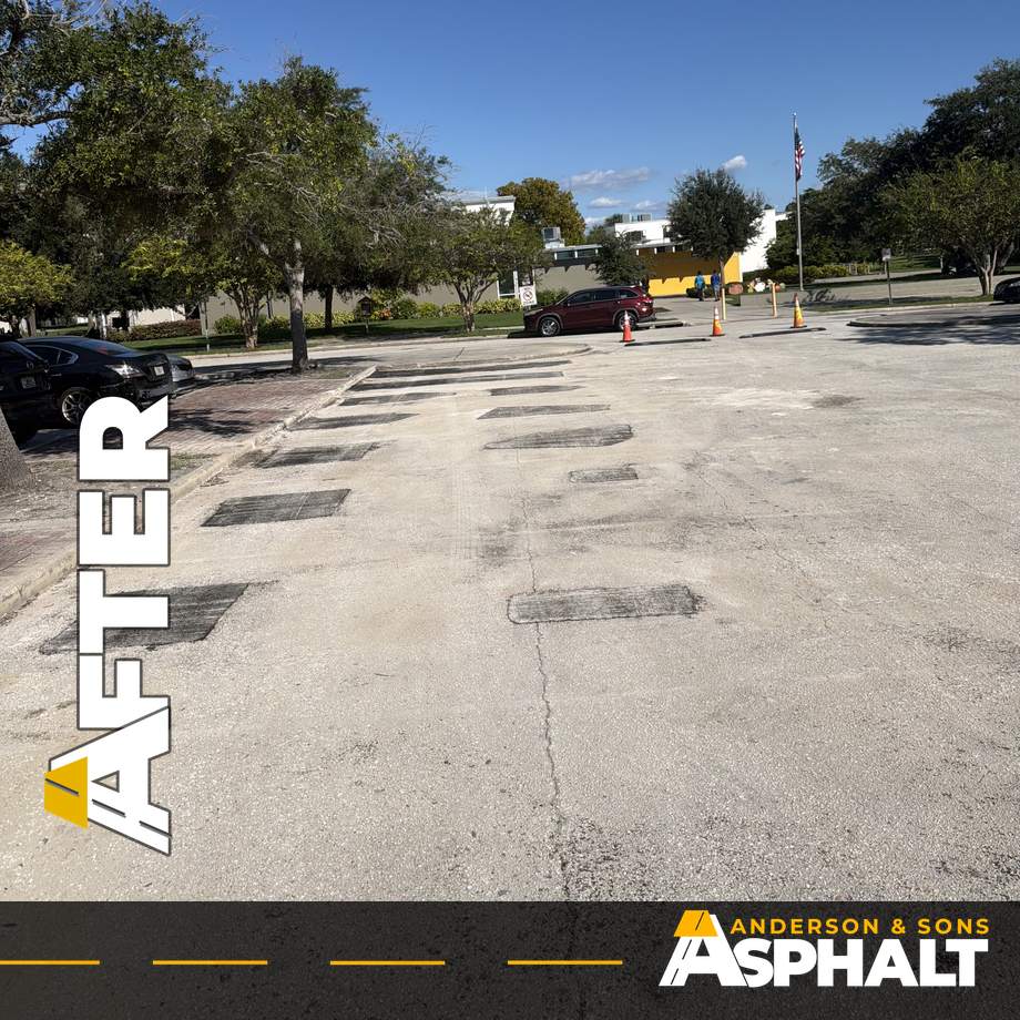 Row of new asphalt patches across a parking lot at Lake Vista Park in St. Petersburg