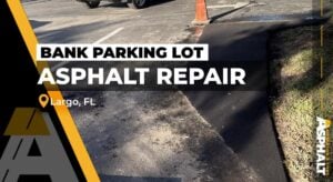 New asphalt repair along a landscaped island at a bank parking lot in Largo, FL